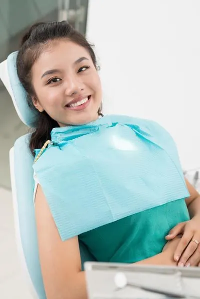 patient smiling after getting a dental crown at Innovative Dentistry