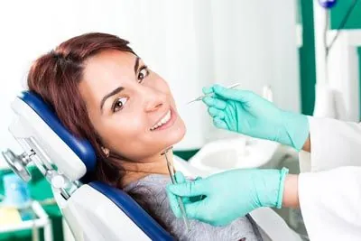 patient smiling during her preventive dental cleaning at Innovative Dentistry